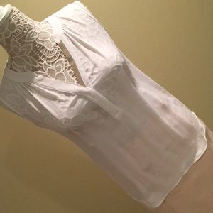 White sleeveless blouse
